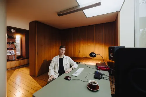 dennis bajer at desk in bauhaus studio